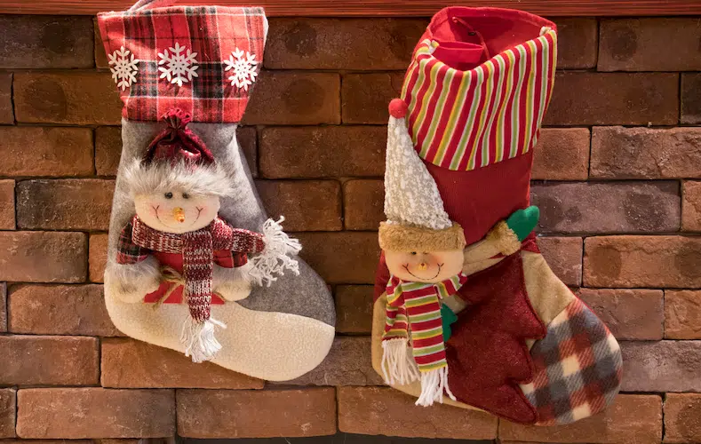 holding Christmas decorations